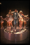 Lee Roy Reams (C) performing "We're In The Money" in a scene from the Broadway production of the musical "42nd Street." (New York)