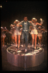Lee Roy Reams (C) performing "We're In The Money" in a scene from the Broadway production of the musical "42nd Street." (New York)