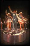 Lee Roy Reams (C) performing "We're In The Money" in a scene from the Broadway production of the musical "42nd Street." (New York)