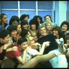 Director/choreographer Gower Champion surrounded by chorus girls during a rehearsal for the Broadway production of the musical "42nd Street." (New York)