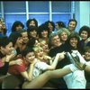 Director/choreographer Gower Champion surrounded by chorus girls during a rehearsal for the Broadway production of the musical "42nd Street." (New York)