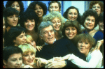 Director/choreographer Gower Champion surrounded by chorus girls during a rehearsal for the Broadway production of the musical "42nd Street." (New York)