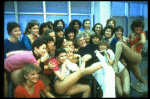 Director/choreographer Gower Champion surrounded by chorus girls during a rehearsal for the Broadway production of the musical "42nd Street." (New York)