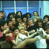 Director/choreographer Gower Champion surrounded by chorus girls during a rehearsal for the Broadway production of the musical "42nd Street." (New York)