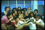 Director/choreographer Gower Champion surrounded by chorus girls during a rehearsal for the Broadway production of the musical "42nd Street." (New York)