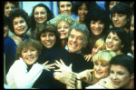 Director/choreographer Gower Champion surrounded by chorus girls during a rehearsal for the Broadway production of the musical "42nd Street." (New York)