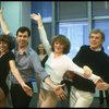 Director Gower Champion (R) w. dancers Wanda Richert (L) and Lee Roy Reams (2L) during a rehearsal for the Broadway production of the musical "42nd Street." (New York)