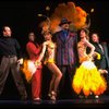 C) Choreographer Christopher Chadman working w. cast of the Broadway revival of the musical "Guys And Dolls." (New York)