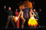 C) Choreographer Christopher Chadman working w. cast of the Broadway revival of the musical "Guys And Dolls." (New York)