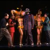 C) Choreographer Christopher Chadman working w. cast of the Broadway revival of the musical "Guys And Dolls." (New York)