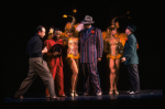 C) Choreographer Christopher Chadman working w. cast of the Broadway revival of the musical "Guys And Dolls." (New York)