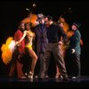 C) Choreographer Christopher Chadman working w. cast of the Broadway revival of the musical "Guys And Dolls." (New York)