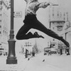 Director-choreographer Michael Bennett leaping in the air as a teenager in Times Square.