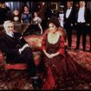 Elizabeth Taylor and Humbert Allen Astredo w. cast in a scene from the Broadway revival of the play "The Little Foxes." (New York)