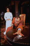 Actors Elizabeth Taylor and Tom Aldredge in a scene from the Broadway revival of the play "The Little Foxes." (New York)
