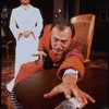 Actors Elizabeth Taylor and Tom Aldredge in a scene from the Broadway revival of the play "The Little Foxes." (New York)