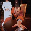 Actors Elizabeth Taylor and Tom Aldredge in a scene from the Broadway revival of the play "The Little Foxes." (New York)