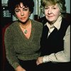 L-R) Actors Elizabeth Taylor and Maureen Stapleton during a break in rehearsals for the Broadway revival of the play "The Little Foxes." (New York)