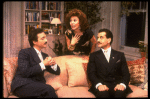 L-R) Actors Lewis J. Stadlen, Rita Moreno and Tony Shalhoub in a scene from the Broadway revival of the play "The Odd Couple." (New York)