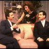 L-R) Actors Lewis J. Stadlen, Rita Moreno and Tony Shalhoub in a scene from the Broadway revival of the play "The Odd Couple." (New York)