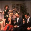 L-R) Actors Rita Moreno, Sally Struthers, Lewis J. Stadlen and Tony Shalhoub in a scene from the Broadway revival of the play "The Odd Couple." (New York)