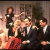 L-R) Actors Rita Moreno, Sally Struthers, Lewis J. Stadlen and Tony Shalhoub in a scene from the Broadway revival of the play "The Odd Couple." (New York)