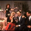 L-R) Actors Rita Moreno, Sally Struthers, Lewis J. Stadlen and Tony Shalhoub in a scene from the Broadway revival of the play "The Odd Couple." (New York)