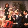 L-R) Actors Rita Moreno, Sally Struthers, Lewis J. Stadlen and Tony Shalhoub in a scene from the Broadway revival of the play "The Odd Couple." (New York)