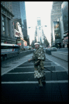 A castmember from the Broadway production of the musical "Pacific Overtures" posing in the middle of Times Square to advertise the show. (New York)