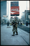 A castmember from the Broadway production of the musical "Pacific Overtures" posing in the middle of Times Square to advertise the show. (New York)
