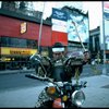 A castmember from the Broadway production of the musical "Pacific Overtures" posing in the middle of Times Square to advertise the show. (New York)