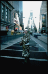 A castmember from the Broadway production of the musical "Pacific Overtures" posing in the middle of Times Square to advertise the show. (New York)