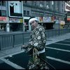 A castmember from the Broadway production of the musical "Pacific Overtures" posing in the middle of Times Square to advertise the show. (New York)