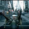 A castmember from the Broadway production of the musical "Pacific Overtures" posing in the middle of Times Square to advertise the show. (New York)