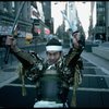 A castmember from the Broadway production of the musical "Pacific Overtures" posing in the middle of Times Square to advertise the show. (New York)