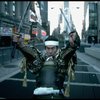 A castmember from the Broadway production of the musical "Pacific Overtures" posing in the middle of Times Square to advertise the show. (New York)