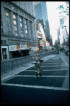 A castmember from the Broadway production of the musical "Pacific Overtures" posing in the middle of Times Square to advertise the show. (New York)