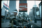 A castmember from the Broadway production of the musical "Pacific Overtures" posing in the middle of Times Square to advertise the show. (New York)