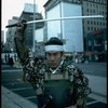 A castmember from the Broadway production of the musical "Pacific Overtures" posing in the middle of Times Square to advertise the show. (New York)