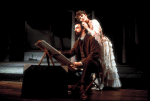 Actors Bernadette Peters and  Mandy Patinkin (as painter Georges Seurat) in a scene from the Broadway production of the musical "Sunday In The Park With George." (New York)