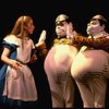 Actress Kate Burton w. actors Robert Boyle & John Remme as Tweedledum and Tweedledee in a scene fr. the Broadway revival of "Alice in Wonderland."