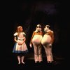 Actress Kate Burton w. actors Robert Boyle & John Remme as Tweedledum and Tweedledee in a scene fr. the Broadway revival of "Alice in Wonderland."