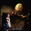 Actress Kate Burton w. Humpty Dumpty in a scene fr. the Broadway revival of "Alice in Wonderland."