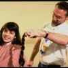 Actress Danielle Findley getting her hair cut in a publicity shot for the Broadway musical "Annie 2: Miss Hannigan's Revenge." (New York)