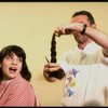 Actress Danielle Findley getting her hair cut in a publicity shot for the Broadway musical "Annie 2: Miss Hannigan's Revenge." (New York)