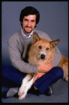 Animal trainer William Berloni w. dog Beau ("Sandy") in a publicity shot for the Broadway musical "Annie 2: Miss Hannigan's Revenge." (New York)