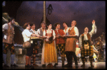 Actors Kenneth Kantor (L) & Elaine Hausman (C) w. male ensemble in a scene fr. the Broadway revival of the musical "Brigadoon." (New York)