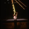 Actor Avner Eisenberg balancing a ladder on his chin in a scene fr. the Off-Broadway one man show "Avner the Eccentric." (New York)