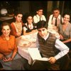 Actors (L-R) Joan Copeland, Elizabeth Perkins, Olivia Laurel Mates, Mark Nelson, Jonathan Silverman (front), Charles Cioffi & Barbara Caruso in a scene fr. the first National tour of the Broadway play "Brighton Beach Memoirs."