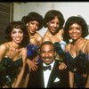 Singer Bobby Short (C) w. ensemble (incl. dancer Mercedes Ellington, L) in a publicity shot fr. the Broadway revue "Black Broadway." (New York)